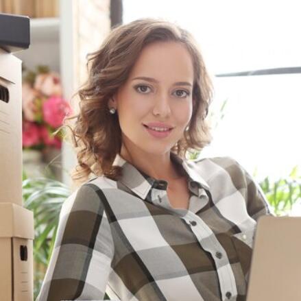 Adult professional woman in a work setting, illustrating the difference between public career identity and dating identity